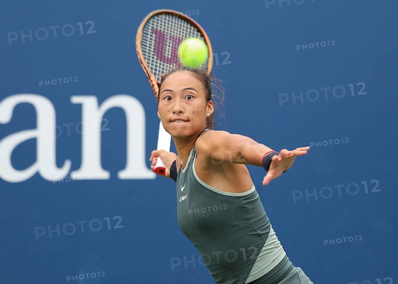 Tennis player Qinwen Zheng of China in action at the US Open 2024 Championships, Billie Jean King Tennis Center, Queens, New York, USA, North America