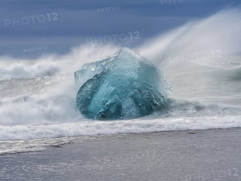 Diamond Beach, iceberg in the surf, near Jökulsarlon glacier lagoon, Vatnajökull National Park, Hornafjörður, South Iceland, Iceland, Europe