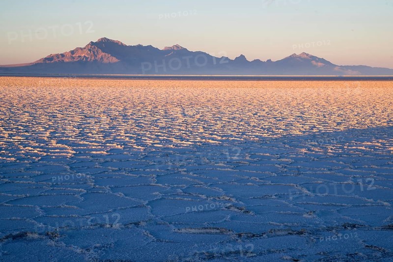 Long shadows fall on the Salt Flats near West Wendover Nevada on the border with Utah