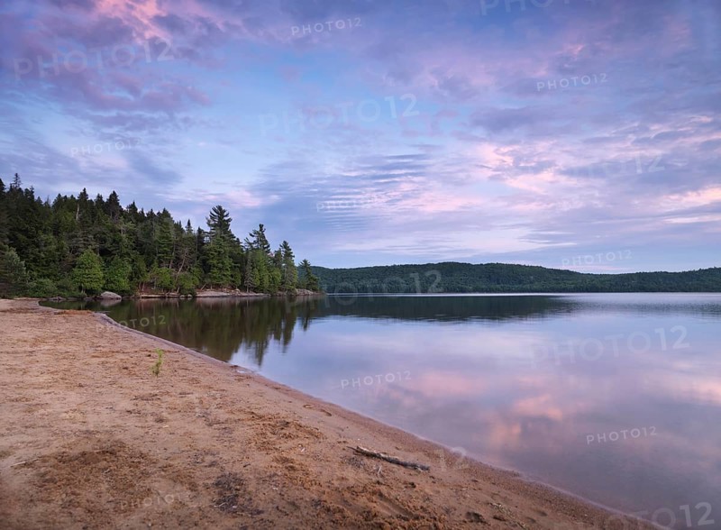 Algonquin Provincial Park summertime nature scenery of the Lake of Two Rivers at sunset. Ontario, Canada, North America