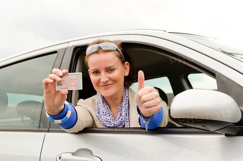Woman with driving licence