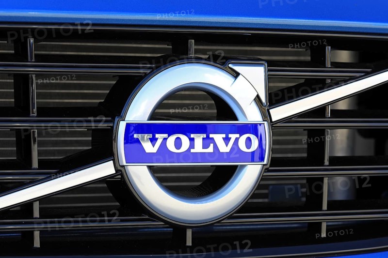 TURKU, FINLAND, JULY 29, 2017: Sign Volvo on the grille of a new blue car. Carmaker Volvo announces that all their new cars launched from 2019 onwards will be partially or completely battery-powered