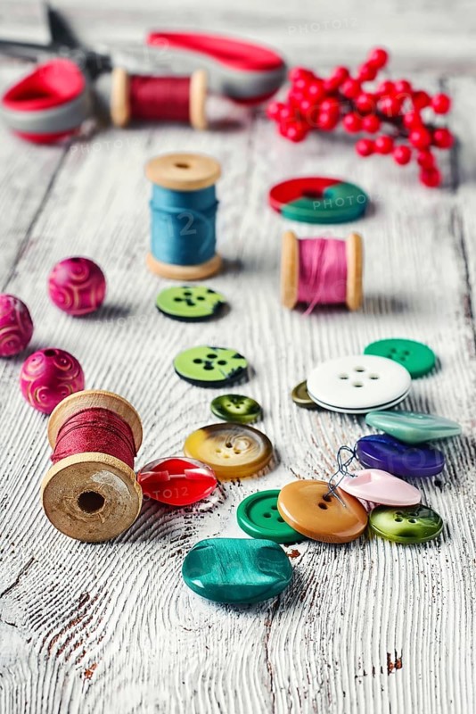 Set of bright beads, threads and decorative items for making jewellery