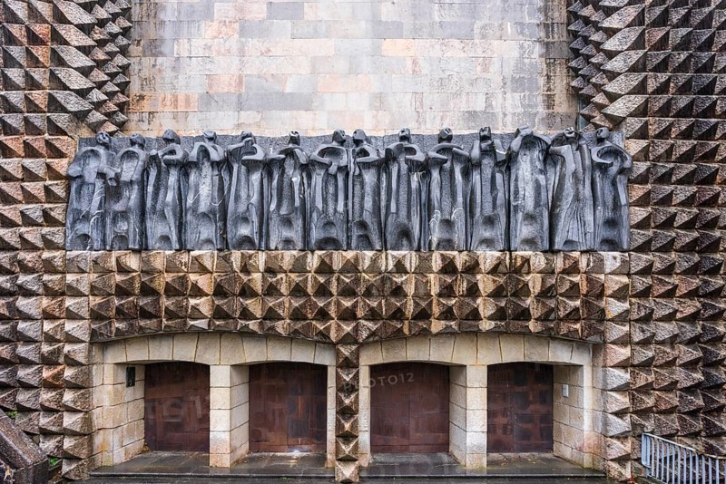 Sculptures of the 14 apostles on the façade, sculptor Jorge Oteiza, and iron doors by Eduardo Chillida, Arantzazu Sanctuary, municipality of Oñati, Basque Country, Spain, Europe