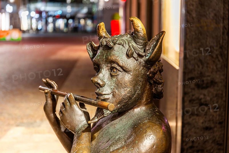 Sculpture, Faun playing flute, night shot, Leoben, Styria, Austria, Europe