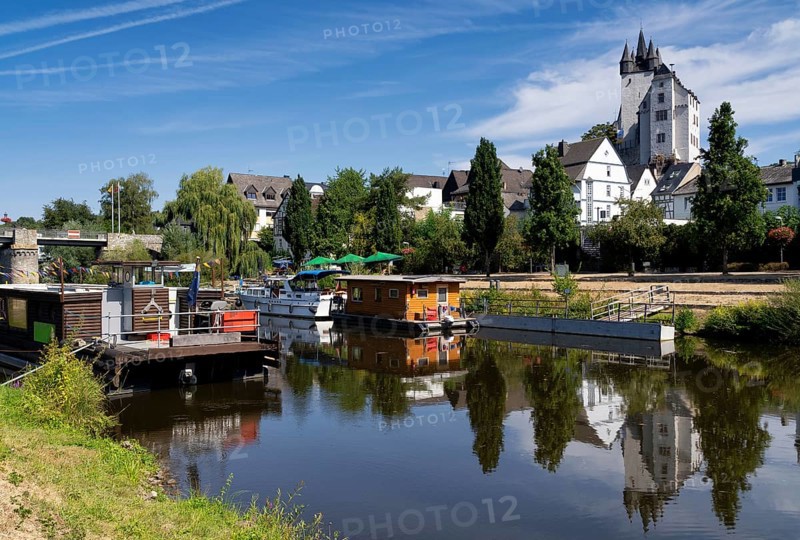 View over the river Lahn to the Grafenschloss castle in the german city Diez