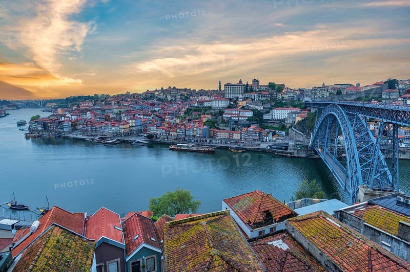 Porto Portugal, sunrise city skyline at Porto Ribeira with Douro River and Dom Luis I Bridge