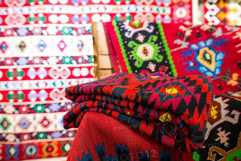 Chiprovtsi Carpets (rugs). Traditional colorful carpets from Chiprovtsi region in Bulgaria. Hand-woven (hand-made) carpets with different elements and colours. Ethnic and folk patterns