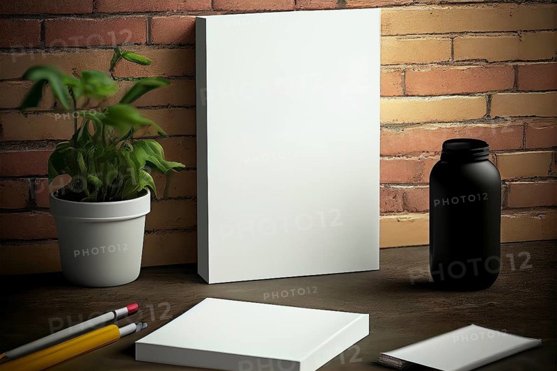 Book cover blank white vertical design template on a table, room interior