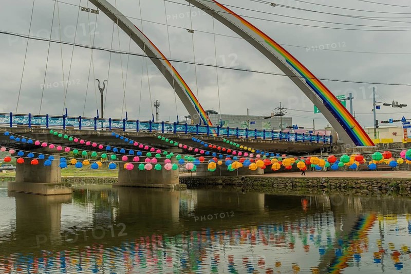Youngdong County, South Korea. April 25, 2019: Paper lanterns hanging from bridge in preparation for Buddha's birthday celebrations