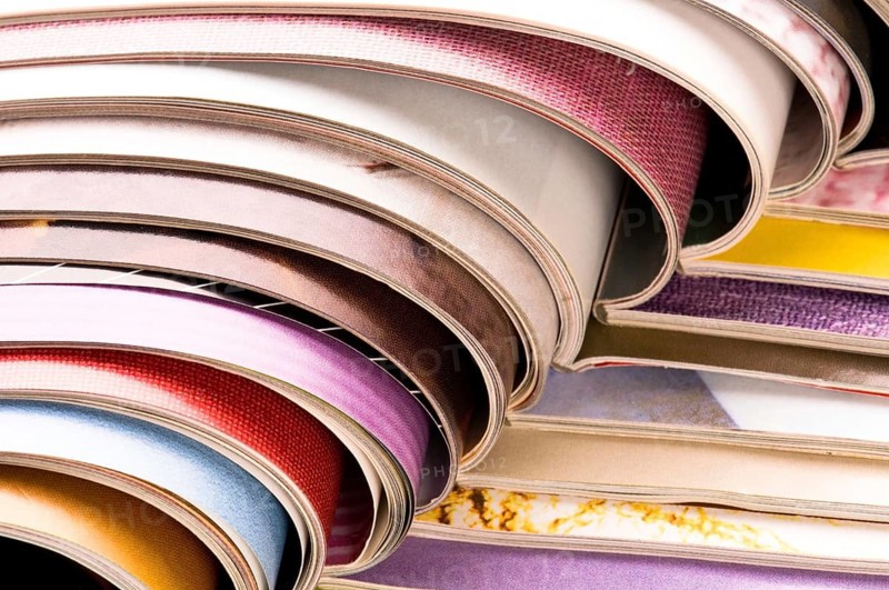 Stack of open magazines