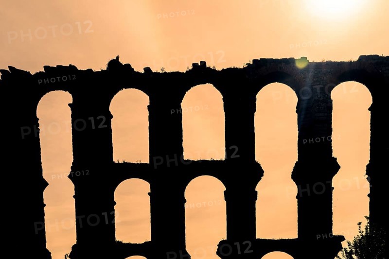 The Acueducto de los Milagros English: Miraculous Aqueduct is the ruins of a Roman aqueduct bridge, part of the aqueduct built