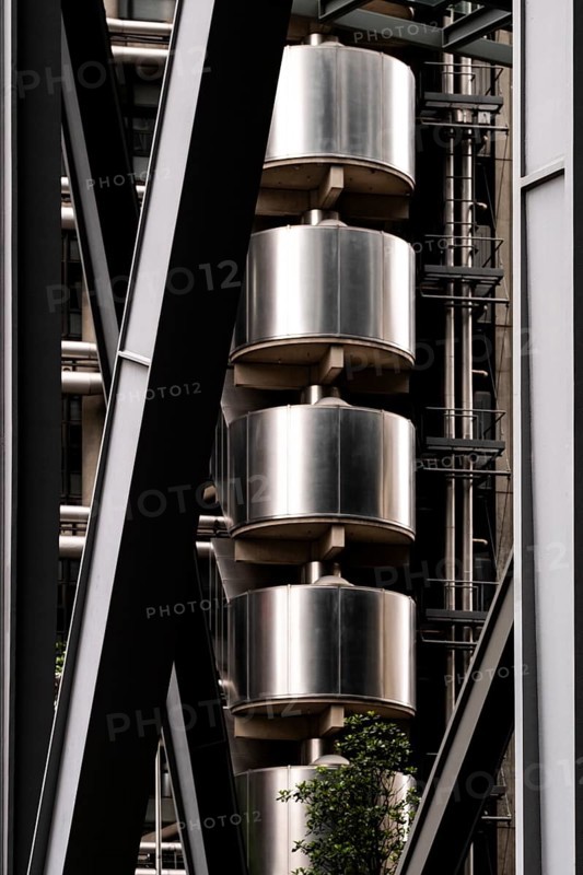 Close-up of an industrial-style building featuring metal structures and vertical elements, London, UK