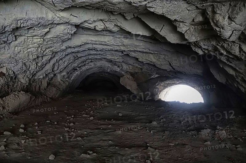 Mudslide destroyed tunnel and road. Natural disaster in mountains in gorge