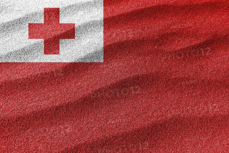 Tonga sand flag, national flag sand background