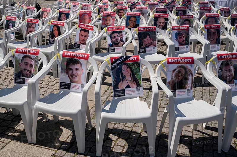17.05.2024, Berlin, Germany, Europe, Portraits of the abducted Israeli hostages are attached to empty chairs on Bebelplatz in Berlin-Mitte in a symbolic installation commemorating the more than 130 hostages, most of them Israeli, who have been held captive by the terrorist organisation Hamas since 7 October 2023, i.e. for more than 200 days, as well as those who have been murdered during this period. For this purpose, part of the square will be temporarily transformed into, Europe