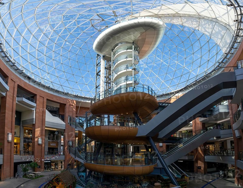 Belfast, United Kingdom, 21 August, 2022: the glass dome and elevator tower inside the Victoria Square shopping complex in downtown Belfast, Europe