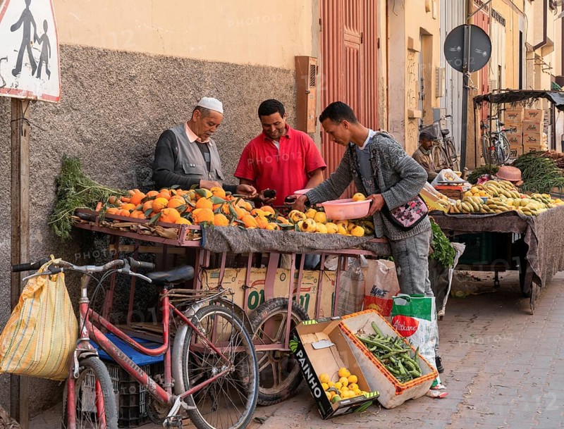 Taroudant, Morocco, 21 March, 2024: greengrocer selling fruit from his pushcart in the streets of Taroudant, Africa