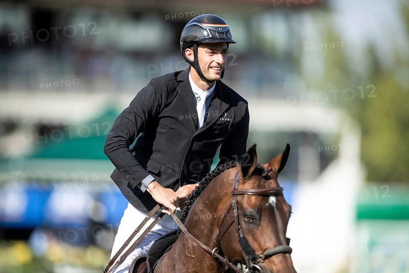 German rider Richard Vogel riding United Touch S competes in the second round and jumpoff of the CPKC International GP at Spruce Meadows Masters, in Calgary, Alberta, Canada, North America