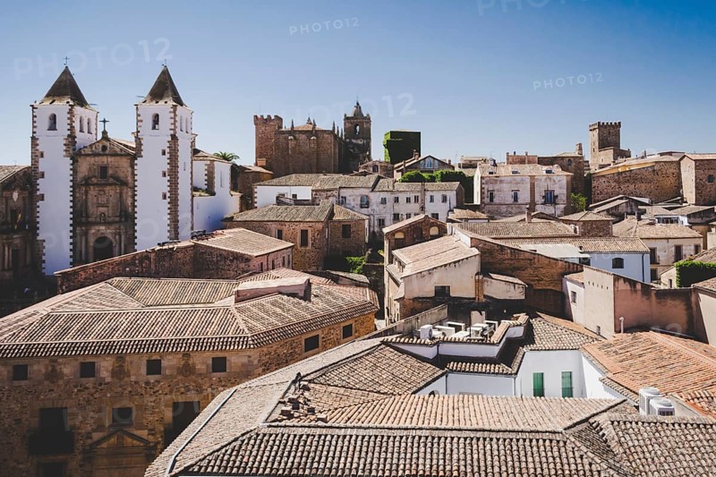 Townscape of the old town of Caceres, Extremadura, Spain, with rooftops and church, Europe