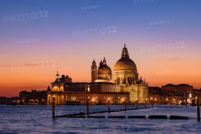 Santa Maria della Salute (Saint Mary of Health) at sunset time, a Catholic church in Venice, Italy, Europe
