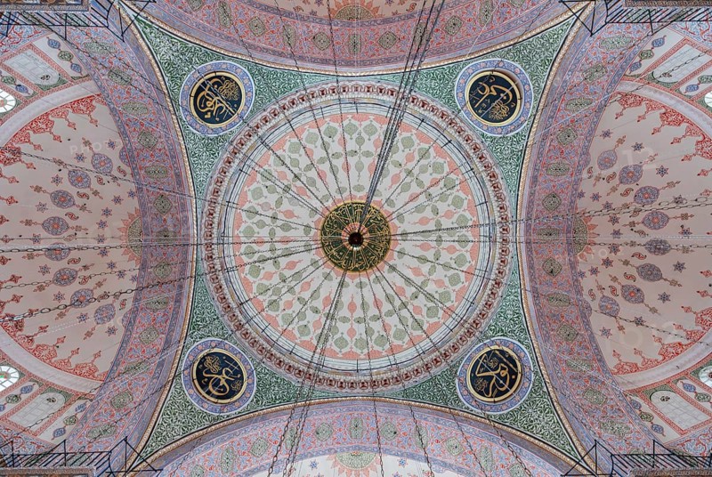 A picture of the colorful and gorgeous interior of the New Mosque, in Istanbul