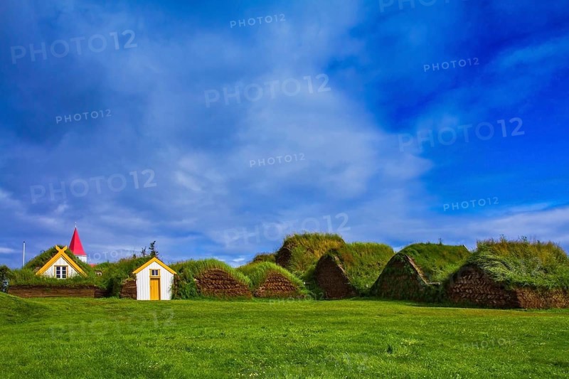 The recreated village - the museum of pioneers - Vikings. The village of ancestors in Iceland. Houses are roofed by the turf