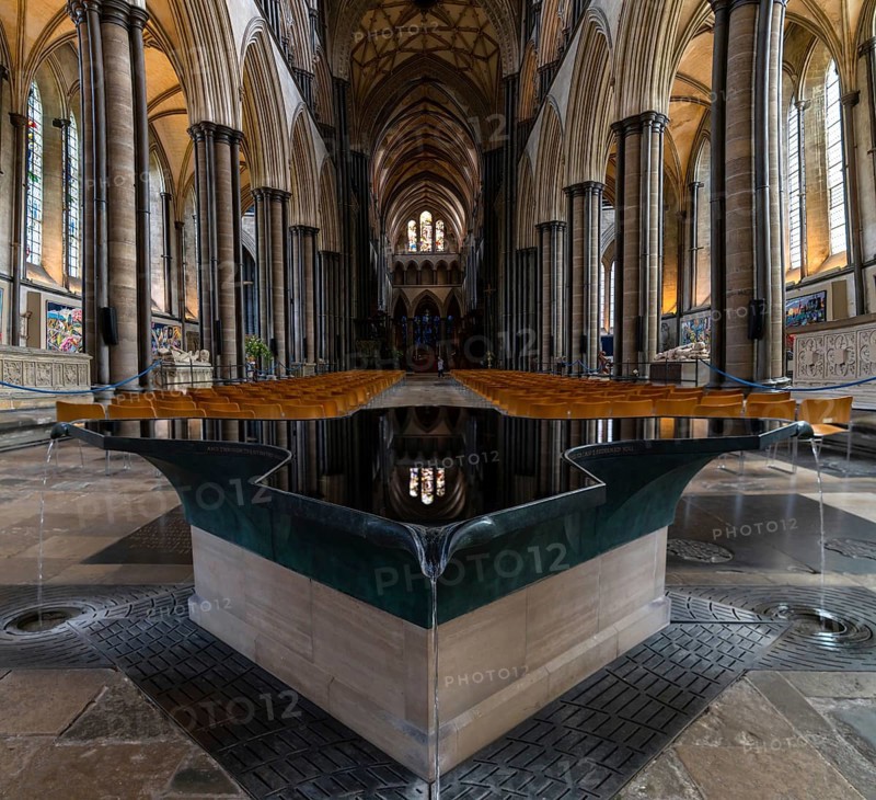 Salisbury, United Kingdom, 8 September, 2022: view of the font by William Pye and the central nave of the historic Salisbury Cathedral, Europe