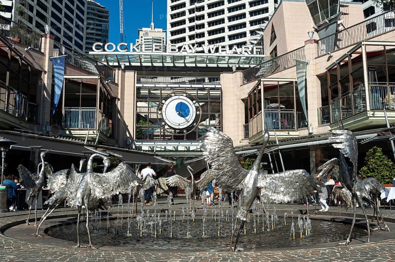 16.09.2018, Sydney, New South Wales, Australia, Cockle Bay Wharf at Darling Harbour with the Dancing Brolga Fountain and the business district in the background, Oceania