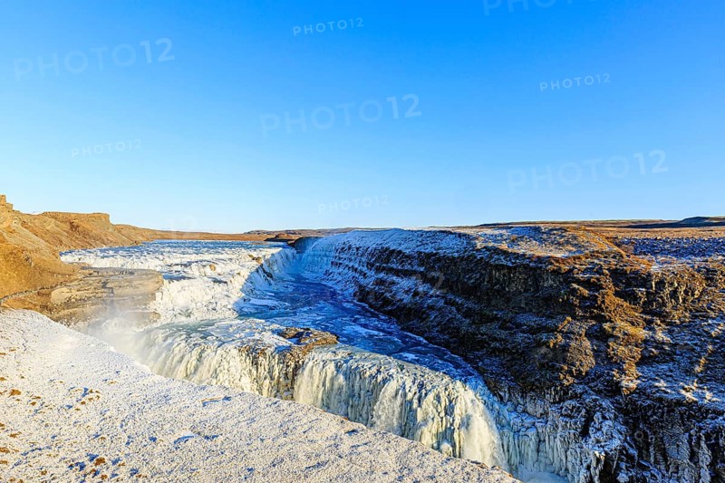 Gullfoss waterfall with ice, Hvítá river, Haukadalur, Golden Circle, South Iceland, Iceland, Europe