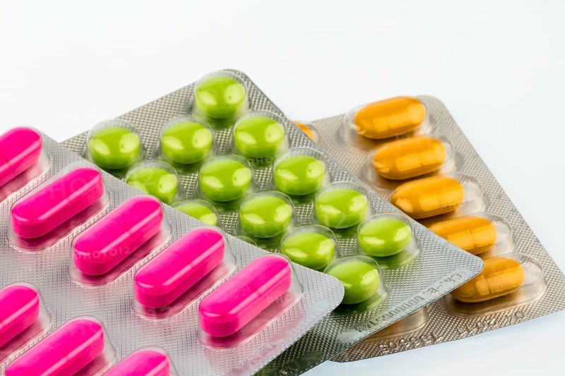 Colourful tablets in blister packaging, symbolic photo for Heilmittel und Gesundheitswesen Austria