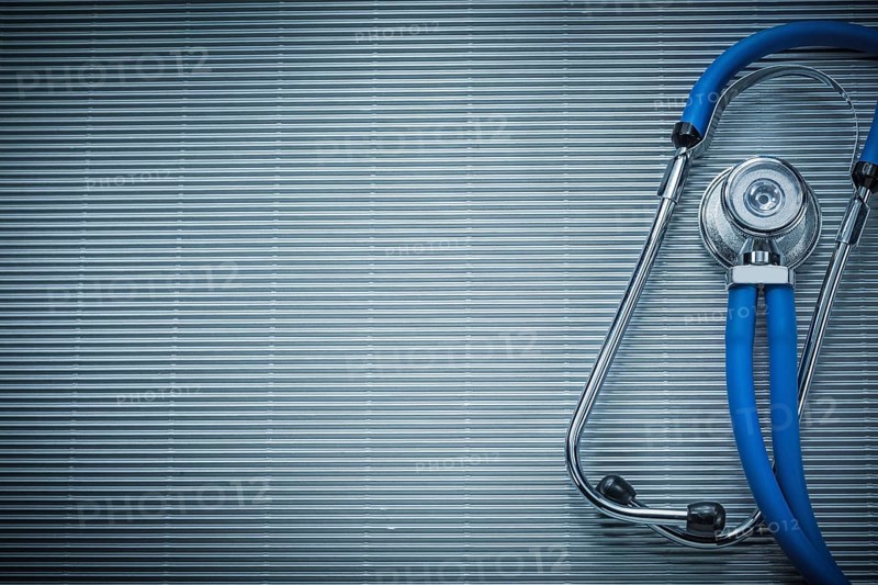 Stethoscope on striped background medicine concept