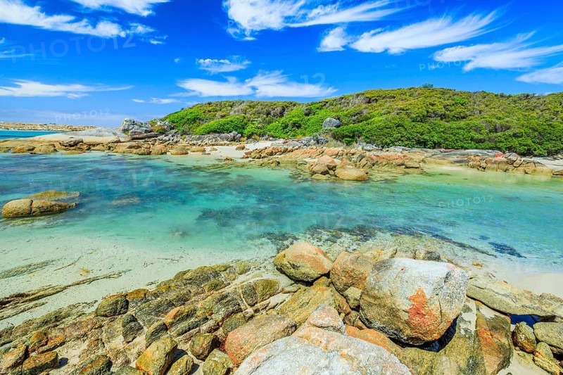 Scenic Madfish Island has the best William Bay rock pools. William Bay NP, Albany region, Western Australia. Sunny day with blue sky. Popular summer destination in Australia