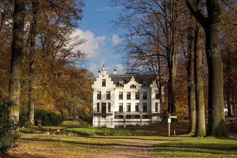 Castle Staverden near Ermelo in the Dutch region Veluwe seen from the surrounding autumn mooded park