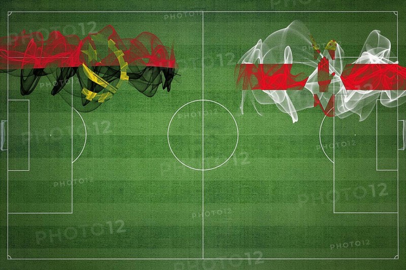Angola vs Northern Ireland Soccer Match, national colors, national flags, soccer field, football game, Competition concept, Copy space