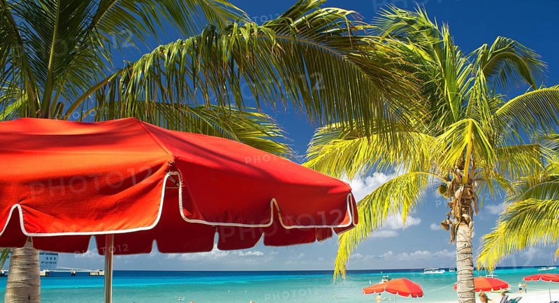 Red Beach Umbrellas and turquoise Waters of Caribbean, Grand Turk