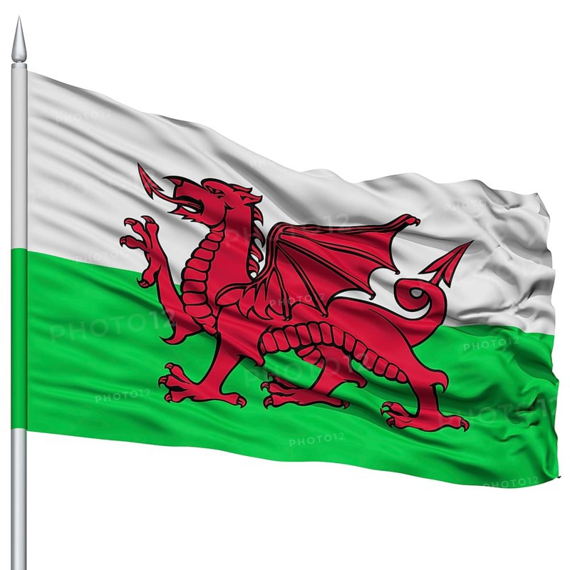 Wales Flag on Flagpole, Flying in the Wind, Isolated on White Background