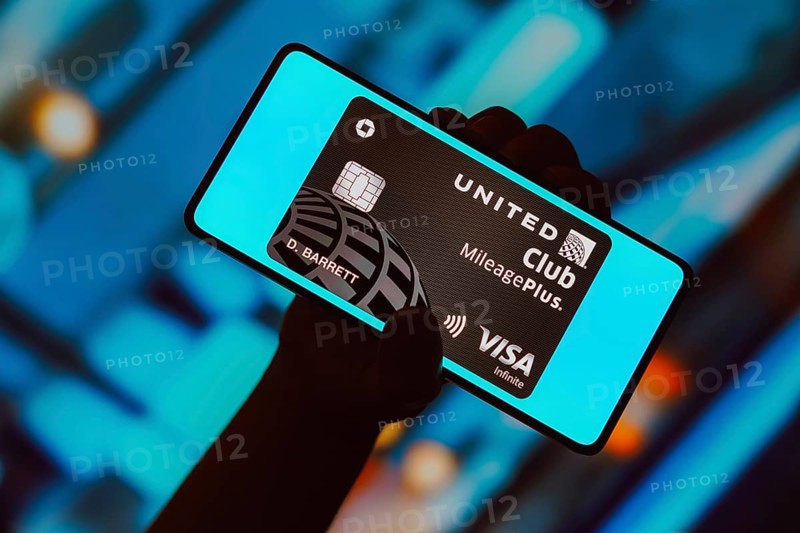 In this photo illustration, the United Club Infinite Card is displayed on a smartphone screen