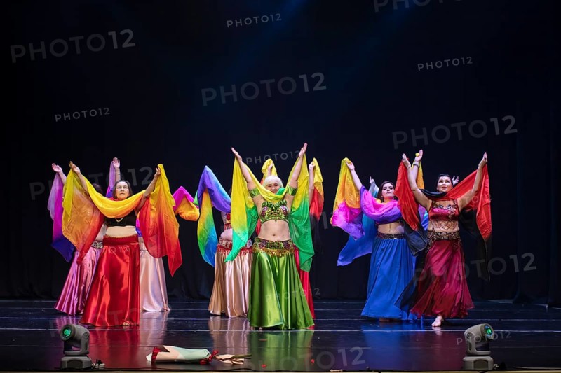 July 01, 2023. Belarus.the city of Gomel. An oriental dance ensemble. A group of women of different ages are dancing an Arabic belly dance