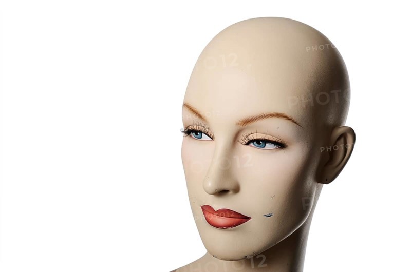 Headshot of a female manneqin over white