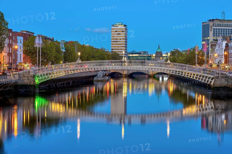 The River Liffey and the famous Ha'penny Bridge in Dublin, Ireland, at dusk, Europe