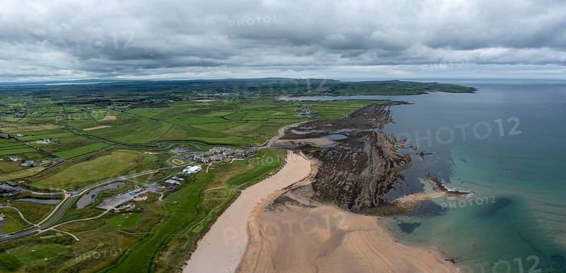 An aerial view of Doughmore Bay and Beach with the Trump International Golf Club hotel and golf course