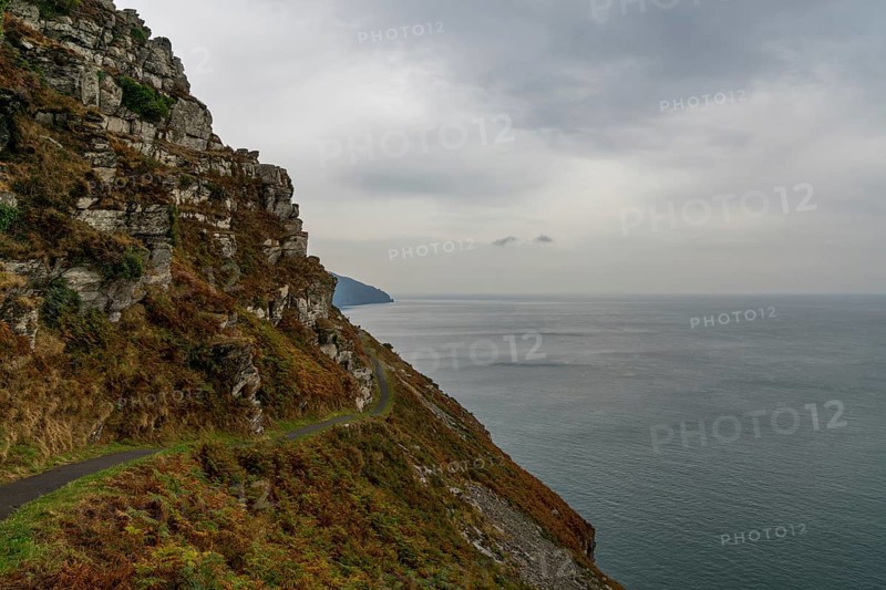 View of the narrow hiking trail on the coastal walk in the Valley of the Rocks in Exmoor in North Devon