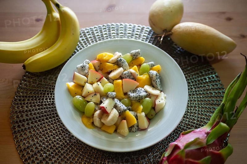 07.04.2019, Singapore, Republic of Singapore, Asia, Freshly prepared fruit salad with mango, banana, green grapes, apple and dragon fruit, Asia