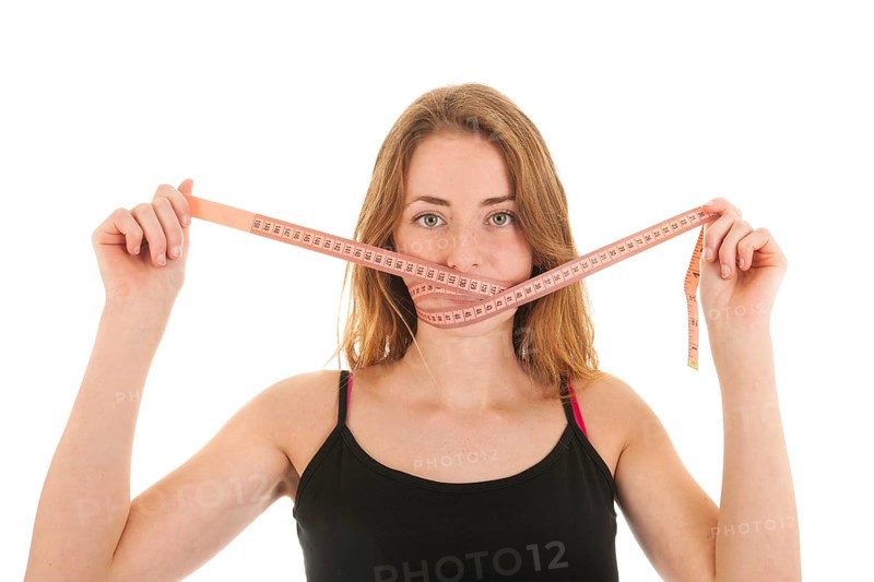Woman with locked mouth for diet