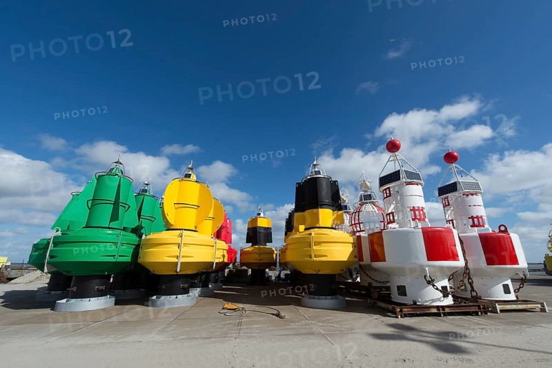 Colorful buoys in stock at the Dutch wadden island Terschelling
