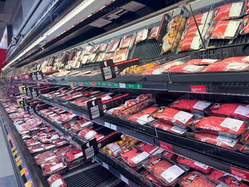 Calgary, Alberta, Canada. Feb 8, 2024. The meat department of a supermarket, complete with both self-service and traditional behind-the-counter offerings