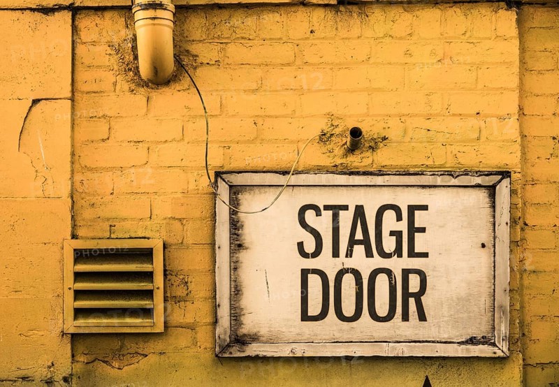 Grungy Stage Door Sign Outside A Theatre