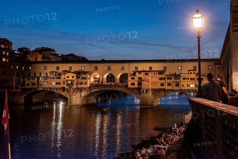 Famous Ponte Vecchio in Florence illuminated at night, Italy, Europe