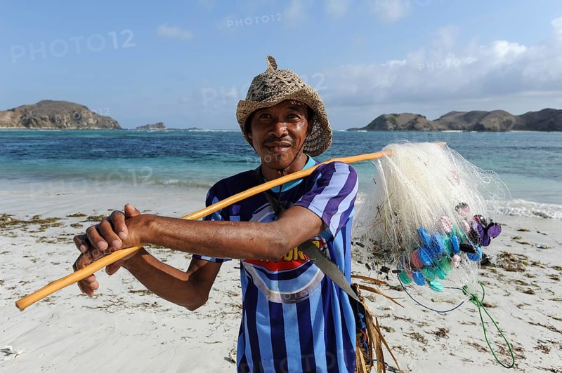 09.09.2011, Lombok, West Nusa Tenggara, Indonesia, Asia, A local fisherman on the beach of Tanjung Aan near the small village of Kuta in the south of the island, Asia